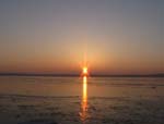 Die Sonne geht über dem Wolziger See auf